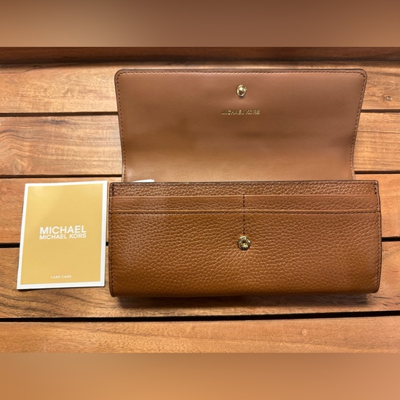 Michael Kors wallet brand new never used. Brown with gold accents. $148 new. - Picture 10 of 14